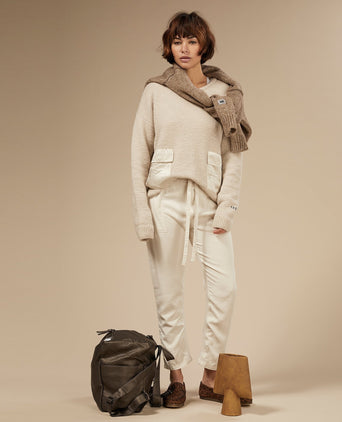 Front women backpack with zipper in leather look with white two stripe in the color bronze